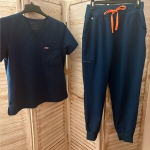 Figs Navy Blue Scrub Set with Orange Accents
